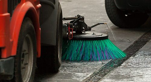Street sweeper machine cleaning the streets